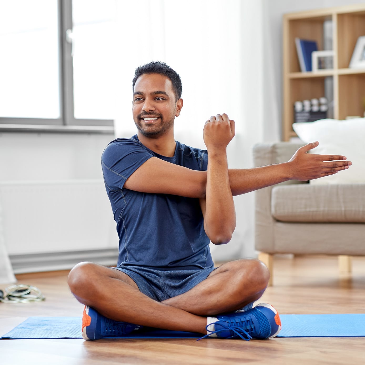Man stretching on the floor