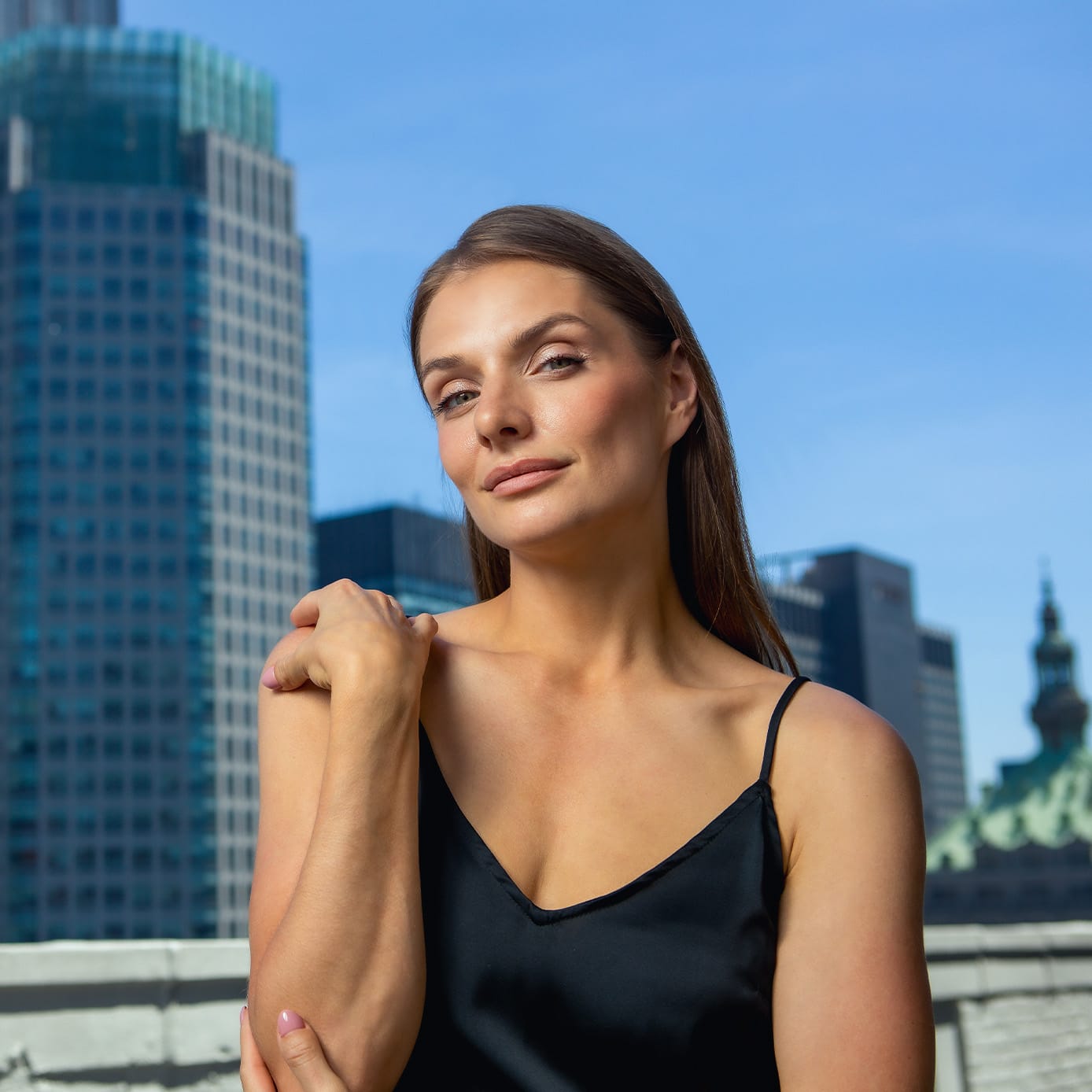 Woman smiling on a balcony